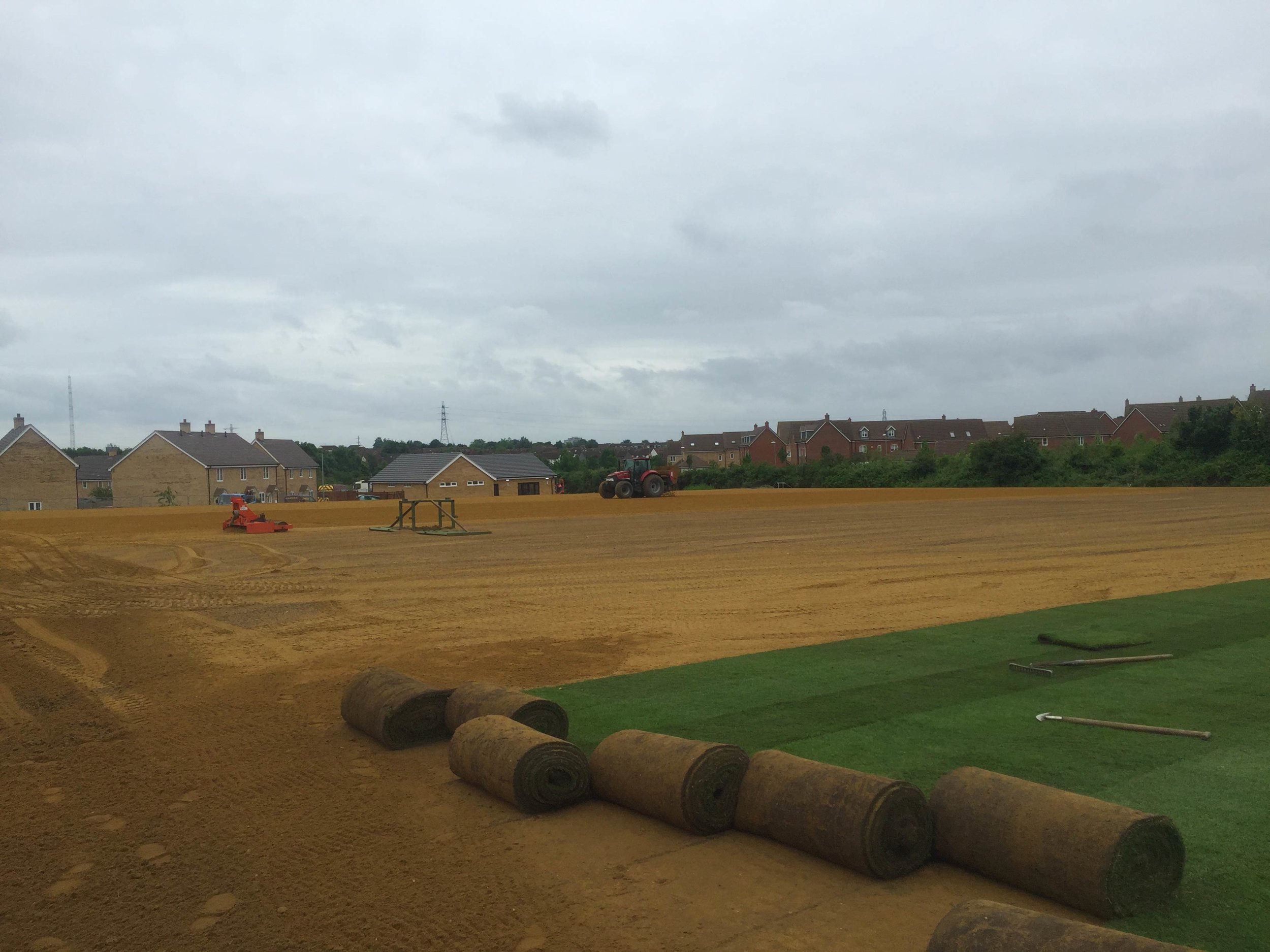 600mm 'Big Roll' turf is laid to get the facilities in full use for the community in time for the completion of the housing development. 