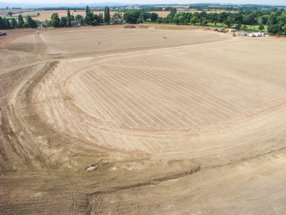 The adult pitch and running track, following drainage installation.