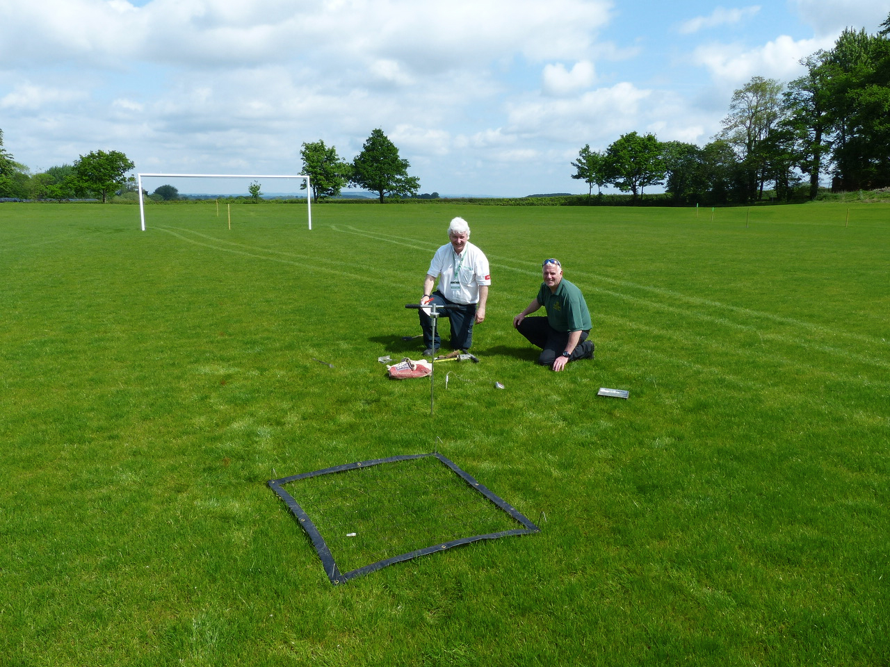 Institute of Groundsmanship Regional Advisor for the West Midlands Kevin Duffill carries out pitch inspection as part of his preparation of detailed written report. 