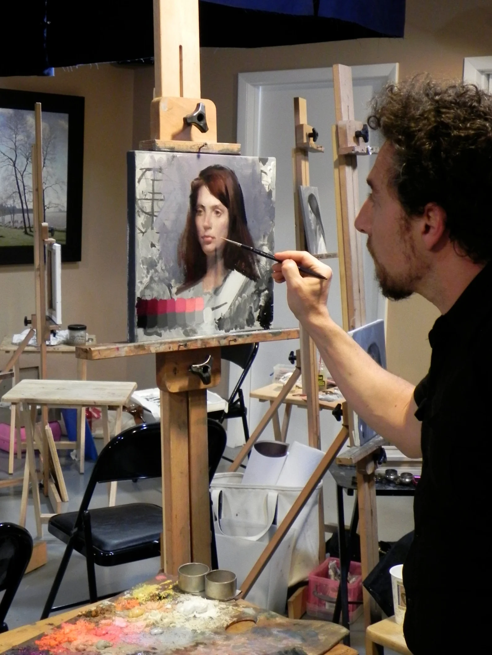 The artist Christopher Pugliese demonstrating how to color a grisaille underpainting, with transparent and opaque glazing.
