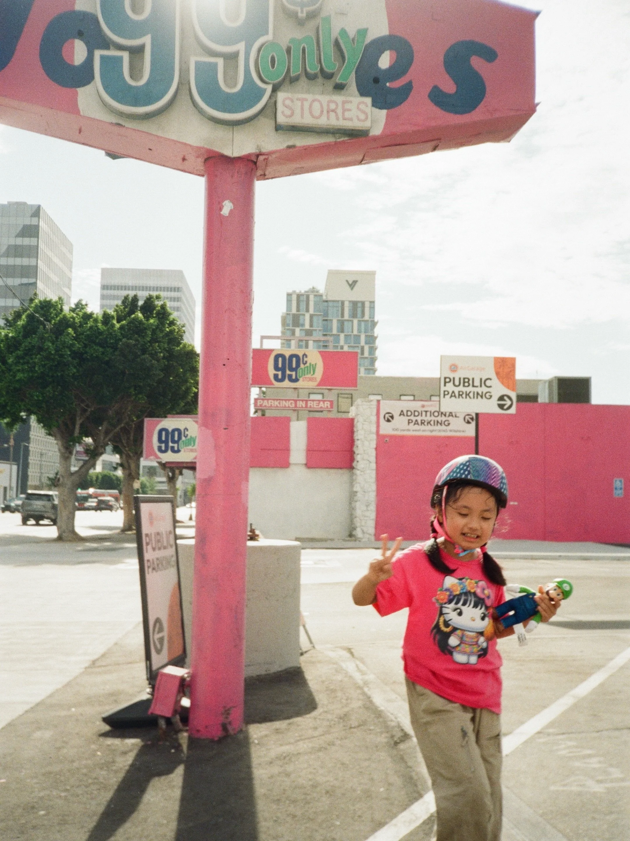 My first roll of film. Couldn&rsquo;t have asked for a better subject ❤️🎞️ 
Layla and I spent a sunny afternoon exploring the neighborhood on her scooter, and these are a few of my favorite moments from the roll.
Shot on: Canon Sure Shot &bull; Fuji