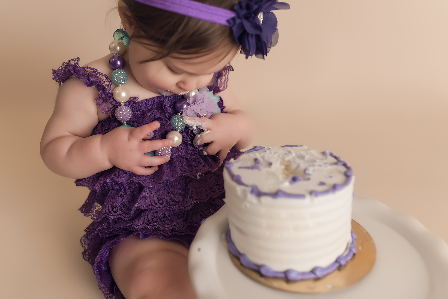 Jessica Fenfert Baltimore Maryland Baby Photographer cake smash girl in purple