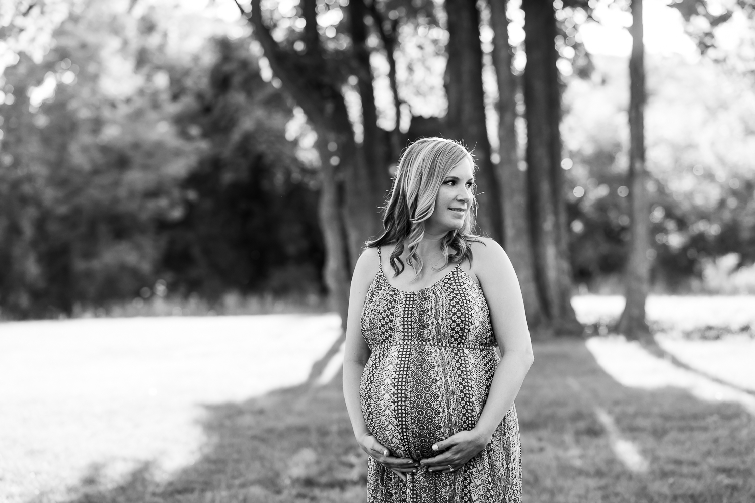 maternity photography pregnant woman light through trees Baltimore Photographer