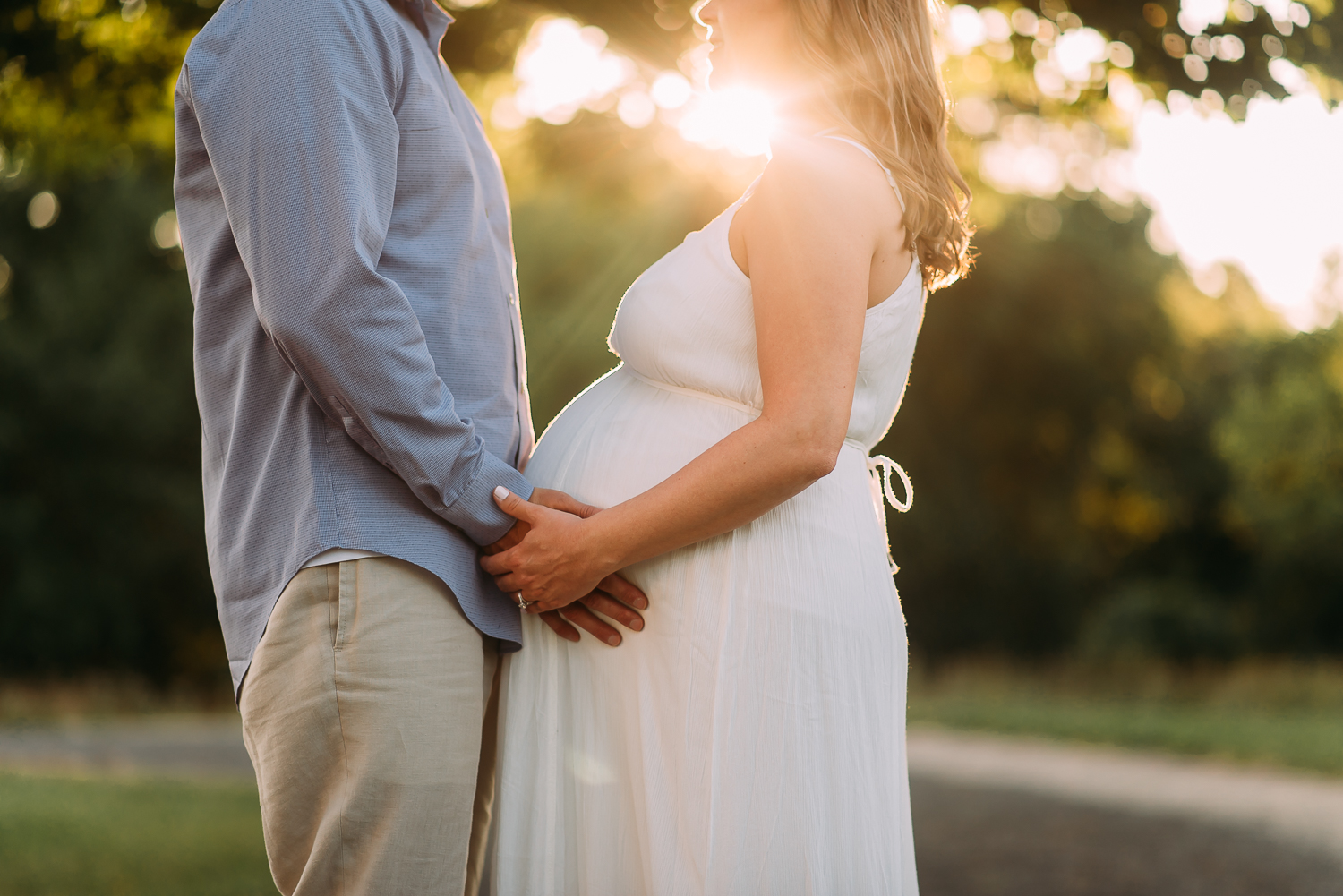 maternity photography pregnant woman with husband bump sunset Baltimore Photographer
