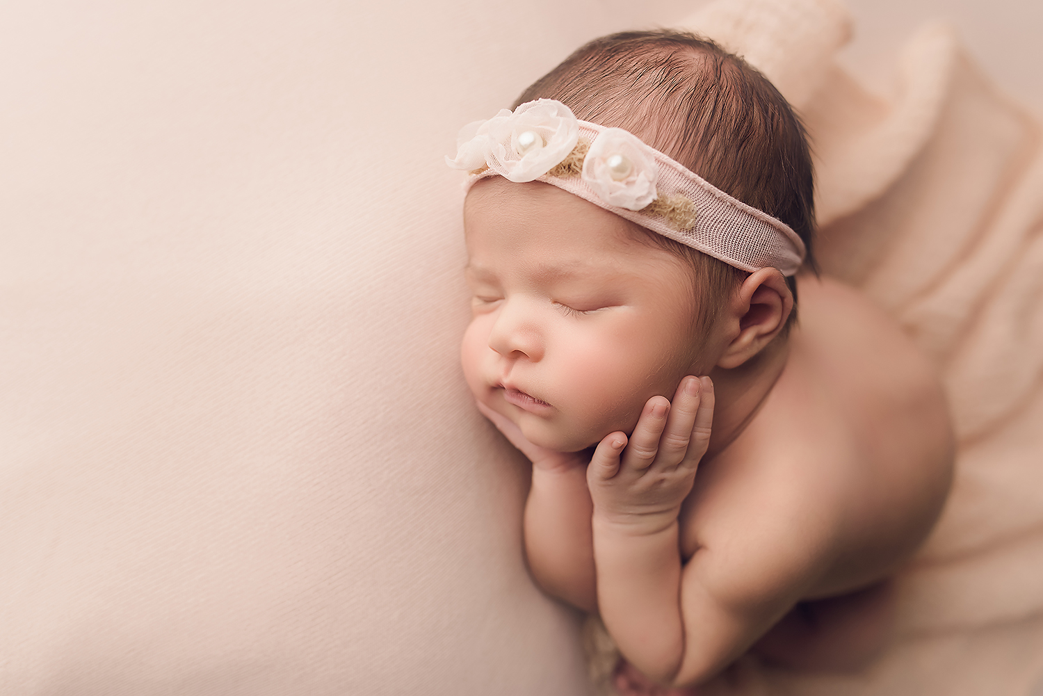 Baltimore Maryland Newborn Photographer Jessica Fenfert baby girl on pink side lying
