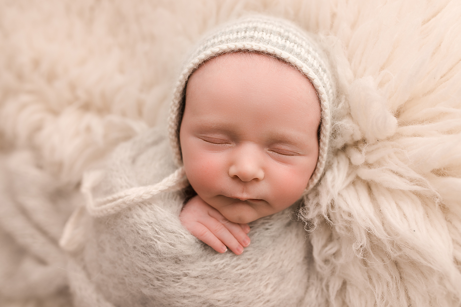 Baltimore Maryland Newborn Photgrapher Jessica Fenfert baby boy cream flokati