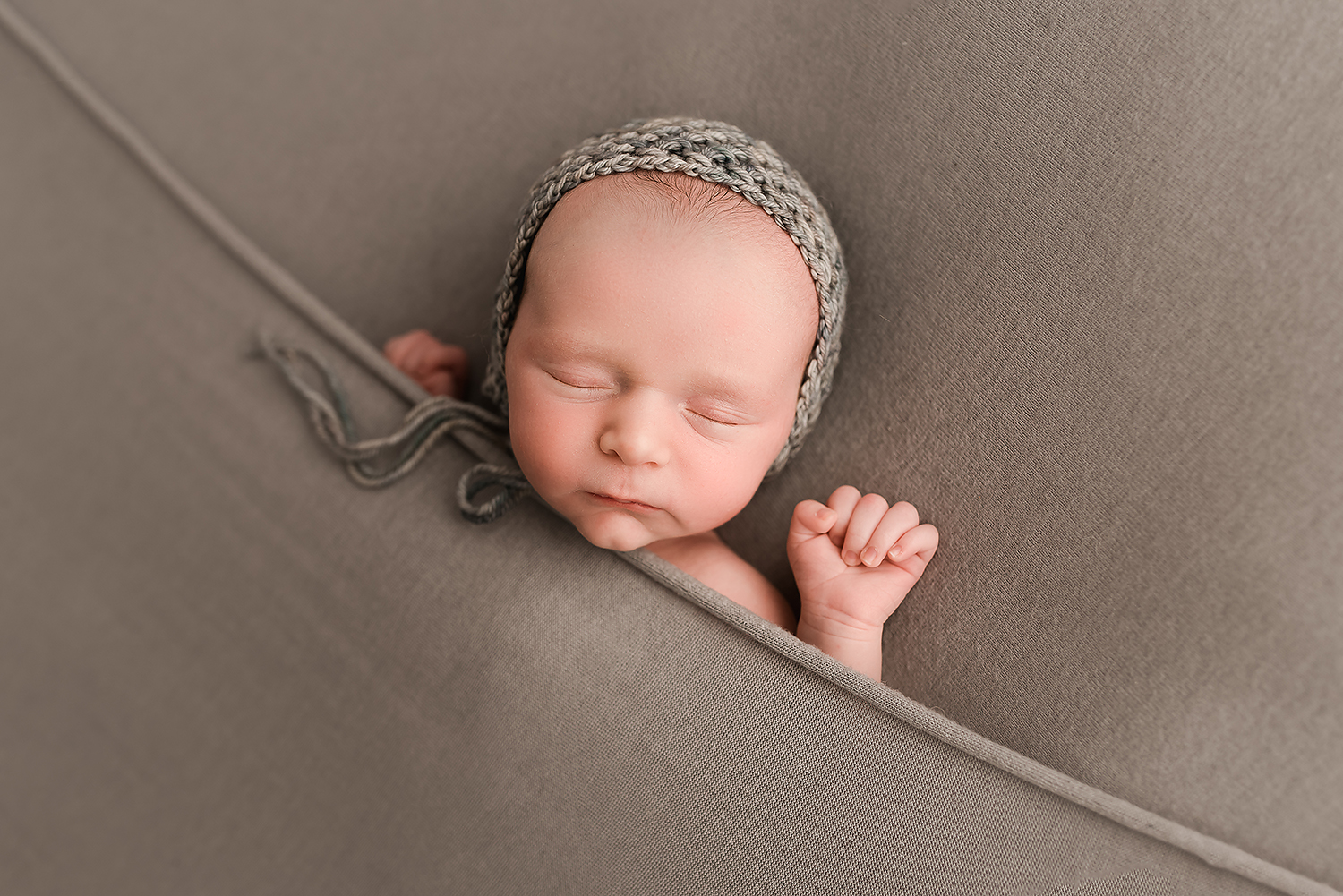 Baltimore Maryland Newborn Photgrapher Jessica Fenfert baby boy tucked in pose