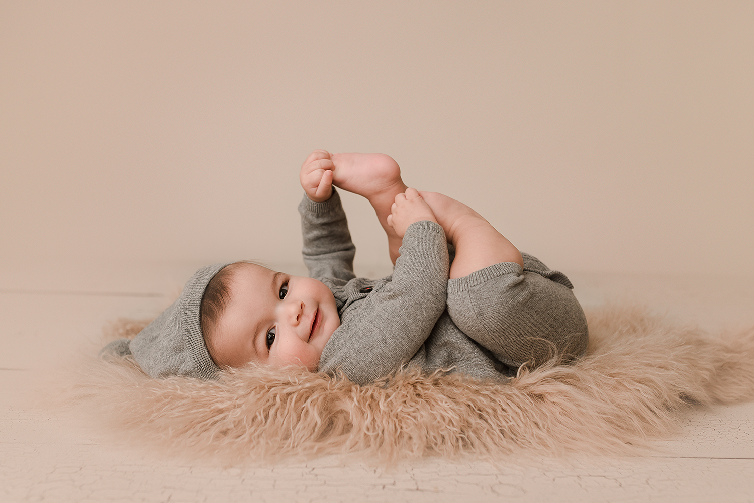 Baltimore Maryland Newborn Baby photography baby boy on fur Jessica Fenfert