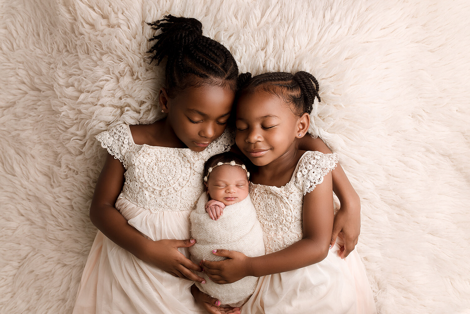 Baltimore Maryland Newborn Photographer Jessica Fenfert Baby girl sisters on flokati