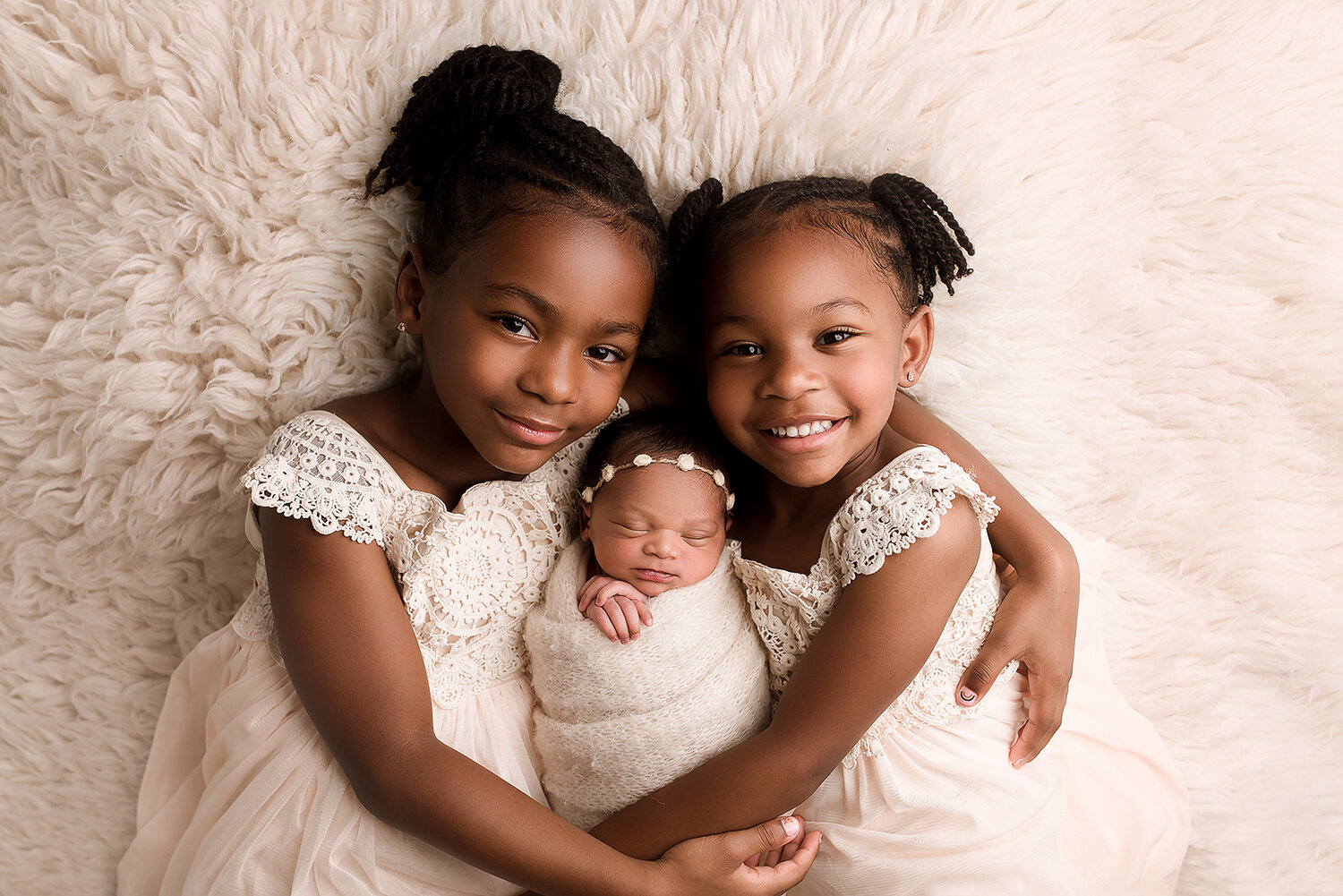 Baltimore Maryland Newborn Photographer Jessica Fenfert Baby girl sisters on flokati