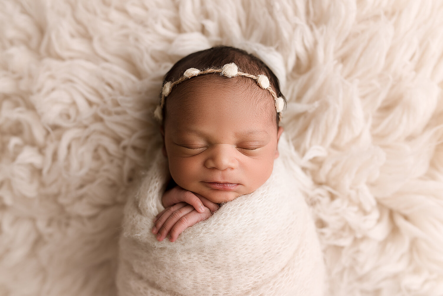 Baltimore Maryland Newborn Photographer Jessica Fenfert Baby girl on ivory flokati