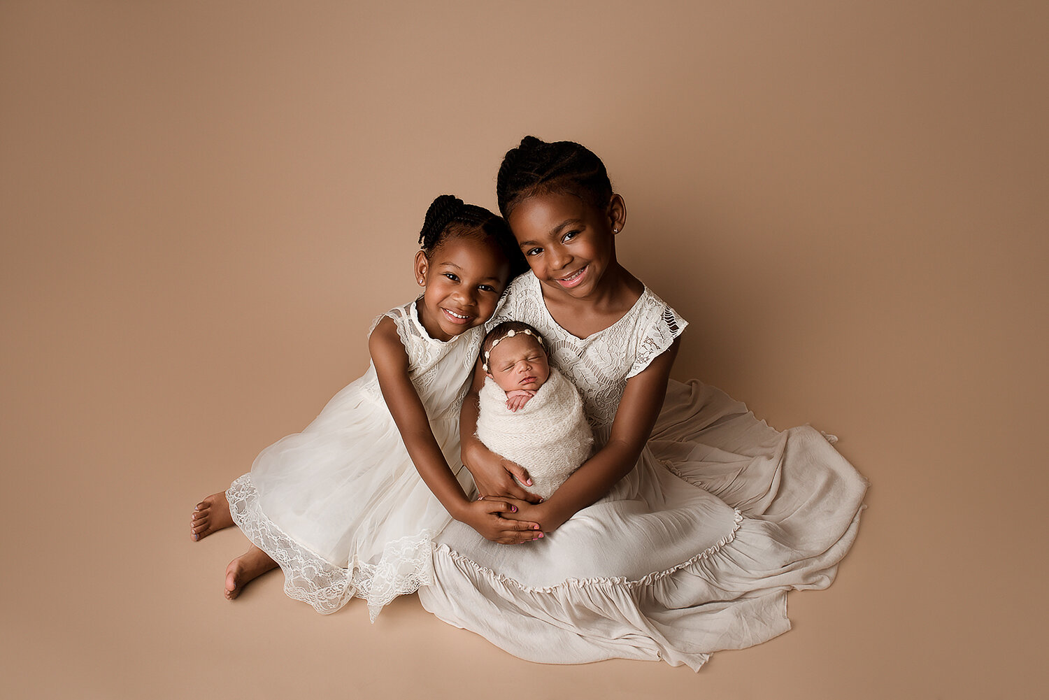 Baltimore Maryland Newborn Photographer Jessica Fenfert Baby girl sisters on mocha seamless
