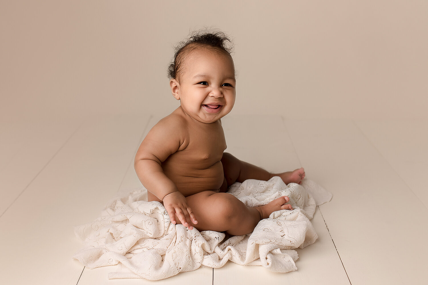 Baltimore Maryland Newborn Baby photography baby girl cream background Jessica Fenfert