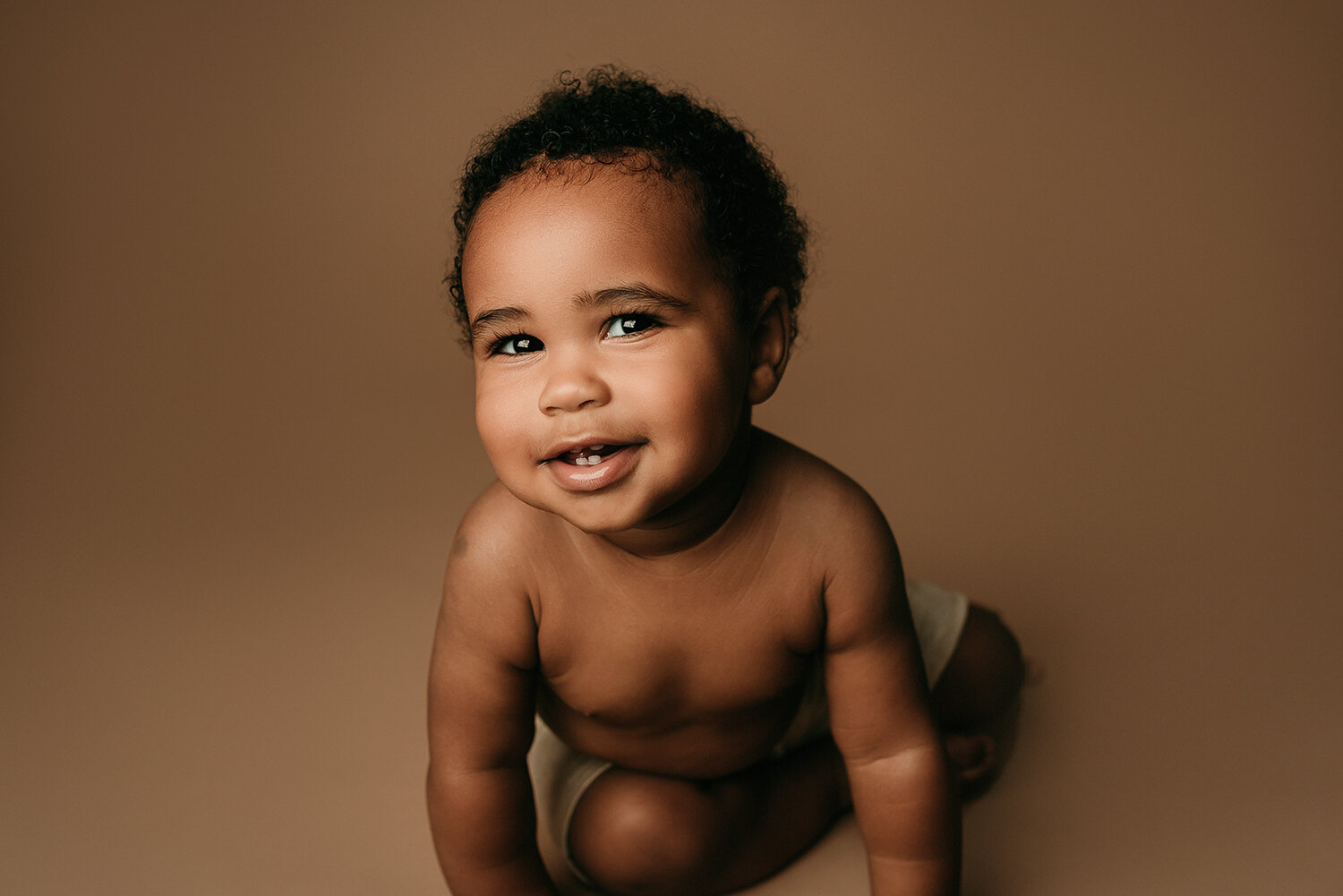Baltimore Maryland Newborn Baby photography baby boy on mocha background Jessica Fenfert