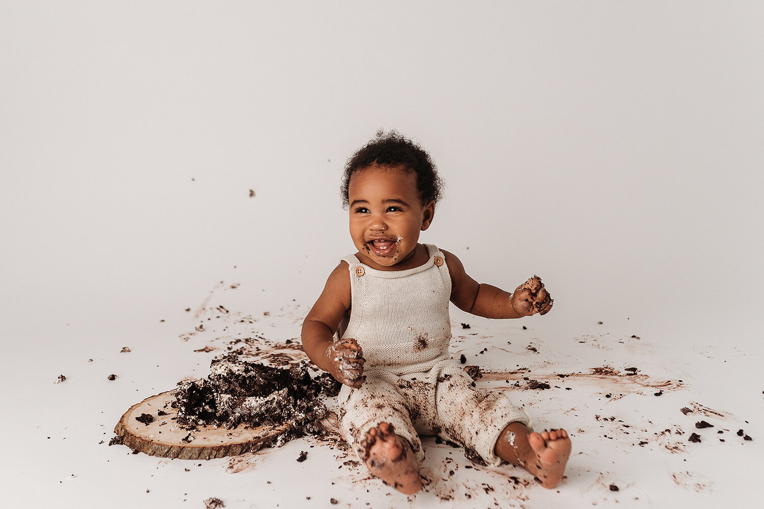 Baltimore Maryland Newborn Baby photography baby boy cake smash on white background Jessica Fenfert