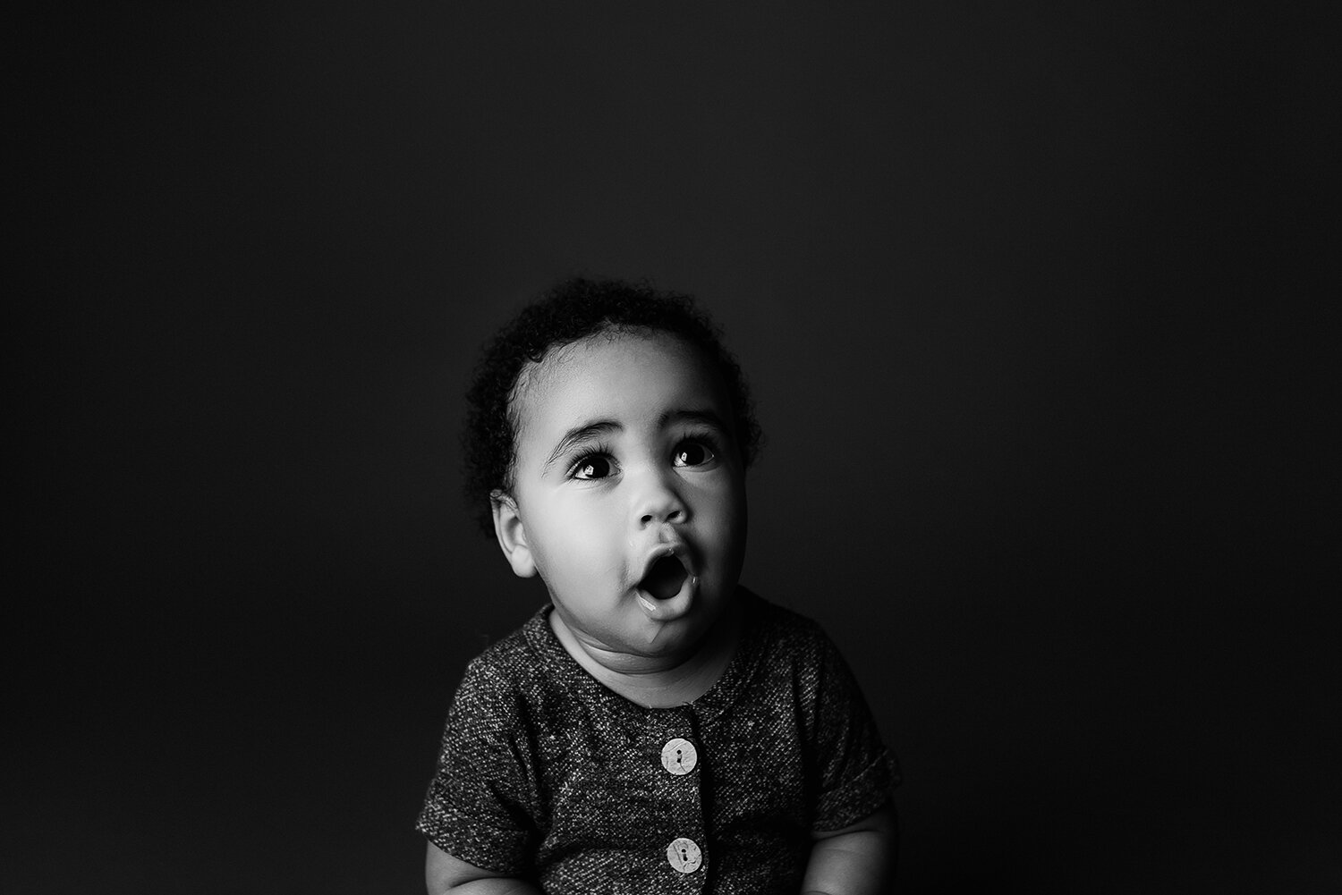 Baltimore Maryland Newborn Baby photography baby boy on black and white background Jessica Fenfert