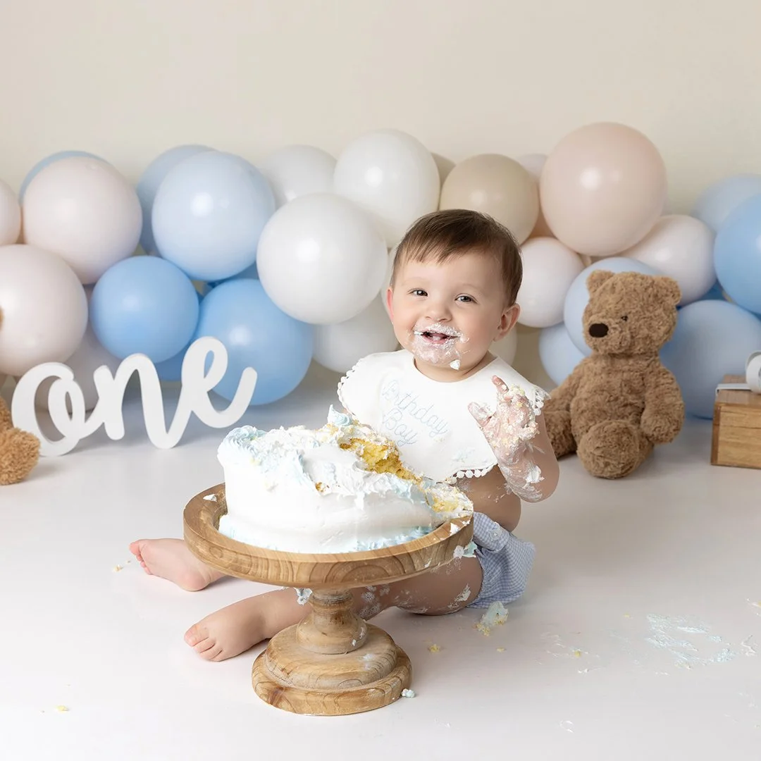 Baby in Cake Smash Scene with a big smile
