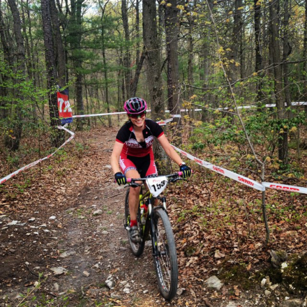 Me rolling into the finish; photo credit to Lindsey