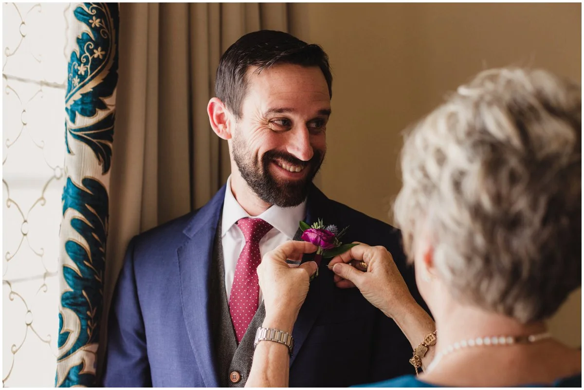 urban-row-photo-groom-with-mom-pinning-boutonniere_0009.jpg