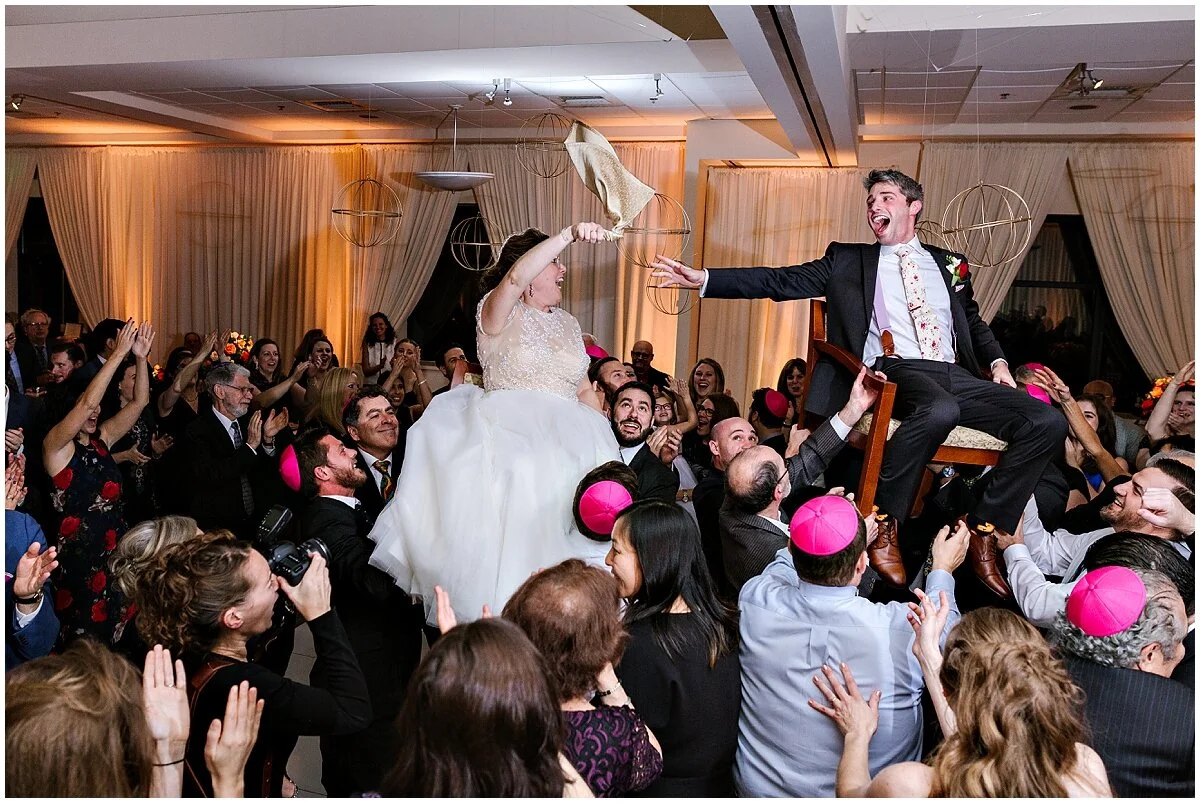 urban-row-photo-jewish-wedding-tradition-hora-couple-up-in-chairs_0037.jpg