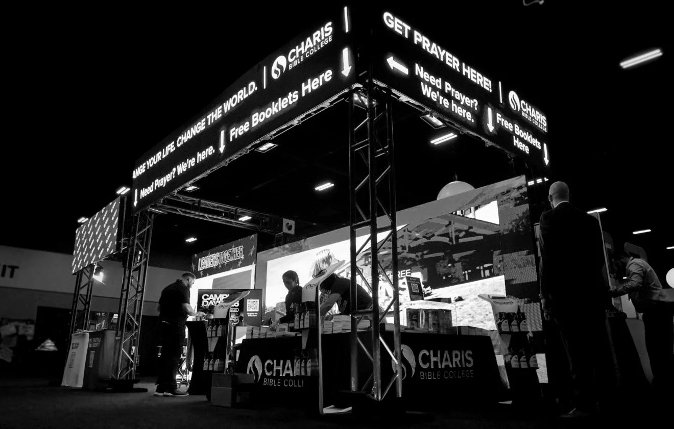 AM Fest 2025.  Trade booth for Truth &  Liberty / Charis Bible College 