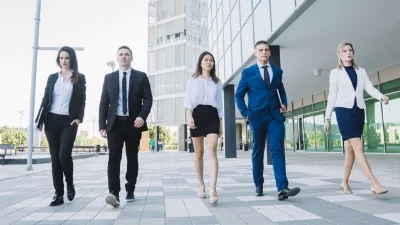 modern-business-team-walking_23-2147707536.jpg