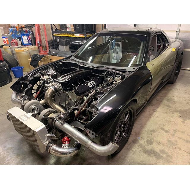 Swipe to see the FD go from a bare longblock to a Twin Turbo ripper. @slow95gsx with the torch.

The FD Rebuild is coming along! Aaron Gregory laid it down with new bumper supports, hood supports, MAVEN Performance Turbo mounts, downpipes/bullhorns, 