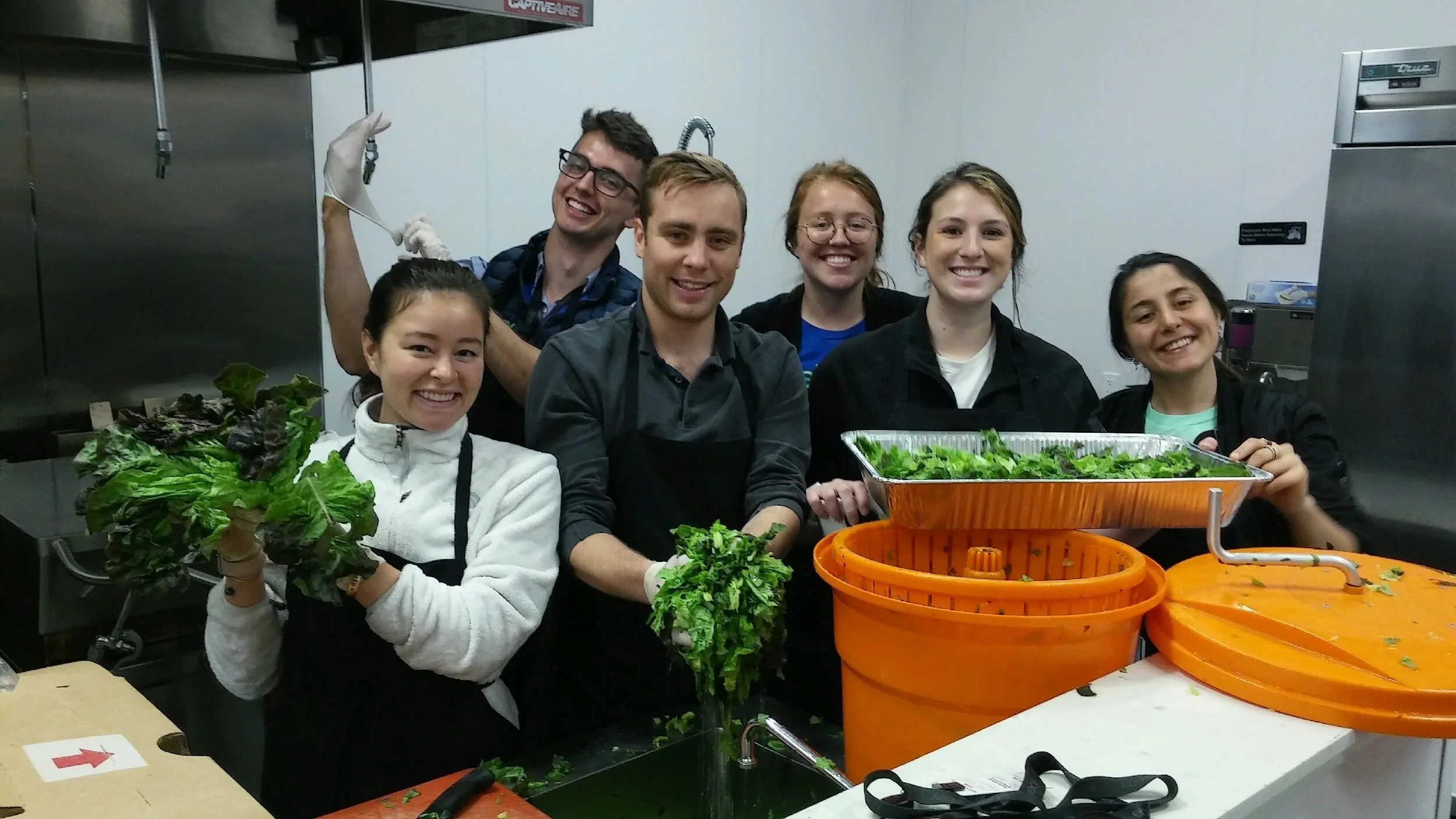 Photo courtesy Anne Santos with Loaves & Fishes Volunteers from eBay help prepare meals at Loaves & Fishes kitchen in Morgan Hill.
