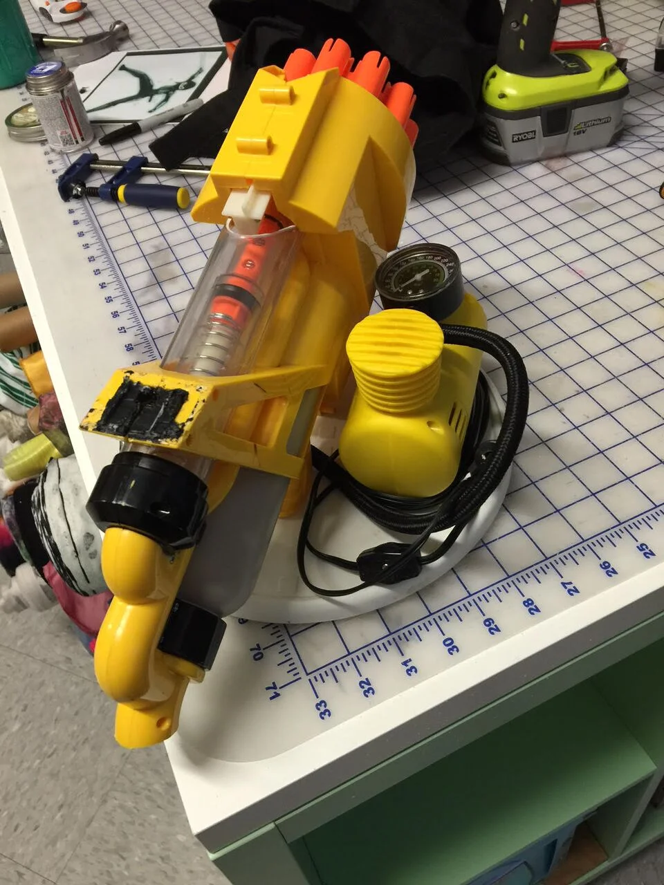 The modified multi-fire Nerf Gun - operated by switch, and rigged to an air compressor.