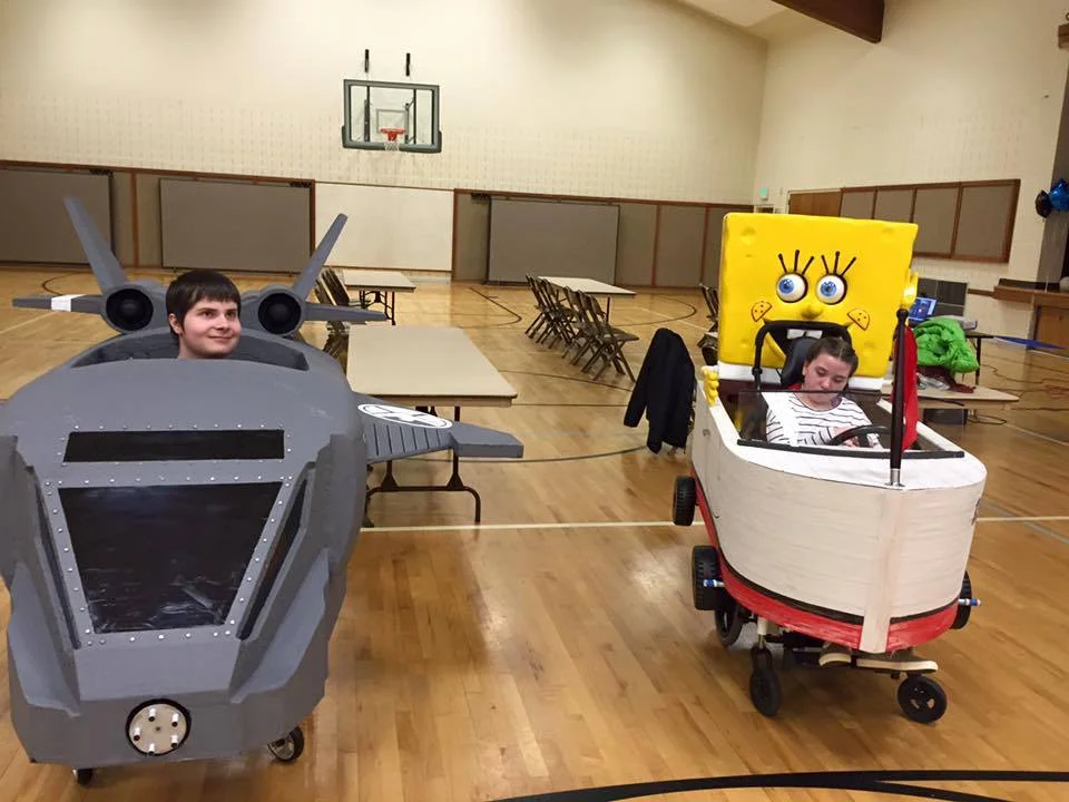 Jade in her SpongeBob boat with Hunter in his Quinjet