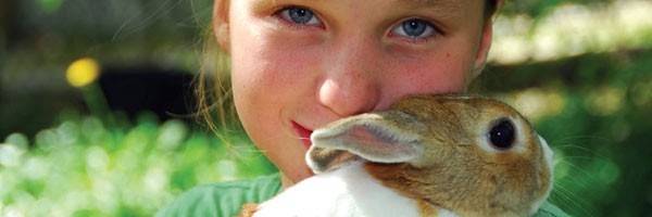 Girl holding her bunny