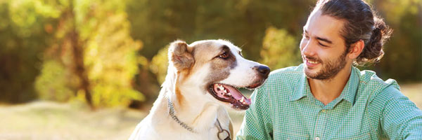 Man and his dog smiling