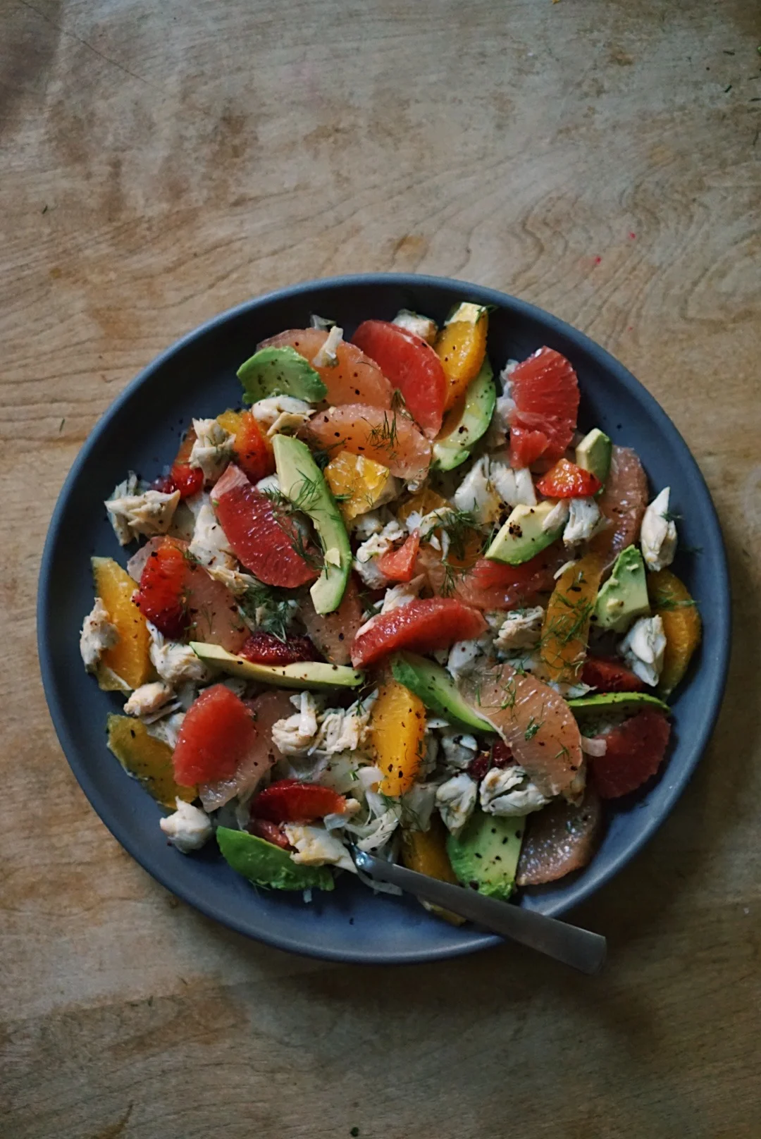 crab, fennel, and citrus salad with avocado and marash