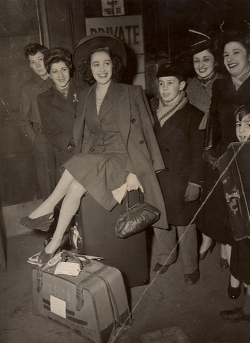 War-era woman wearing a suit (Flickr Commons)