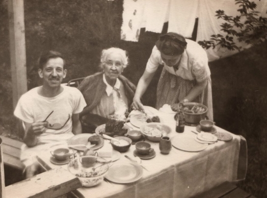 Serving dinner to my father and his mother
