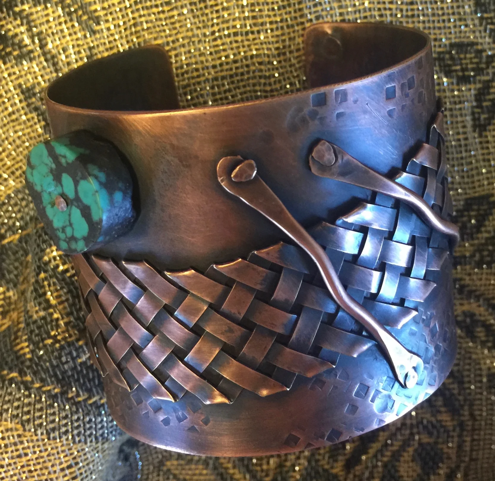 "Organic" rivets :)... but I love the turquoise element with the plaited bezel wire.