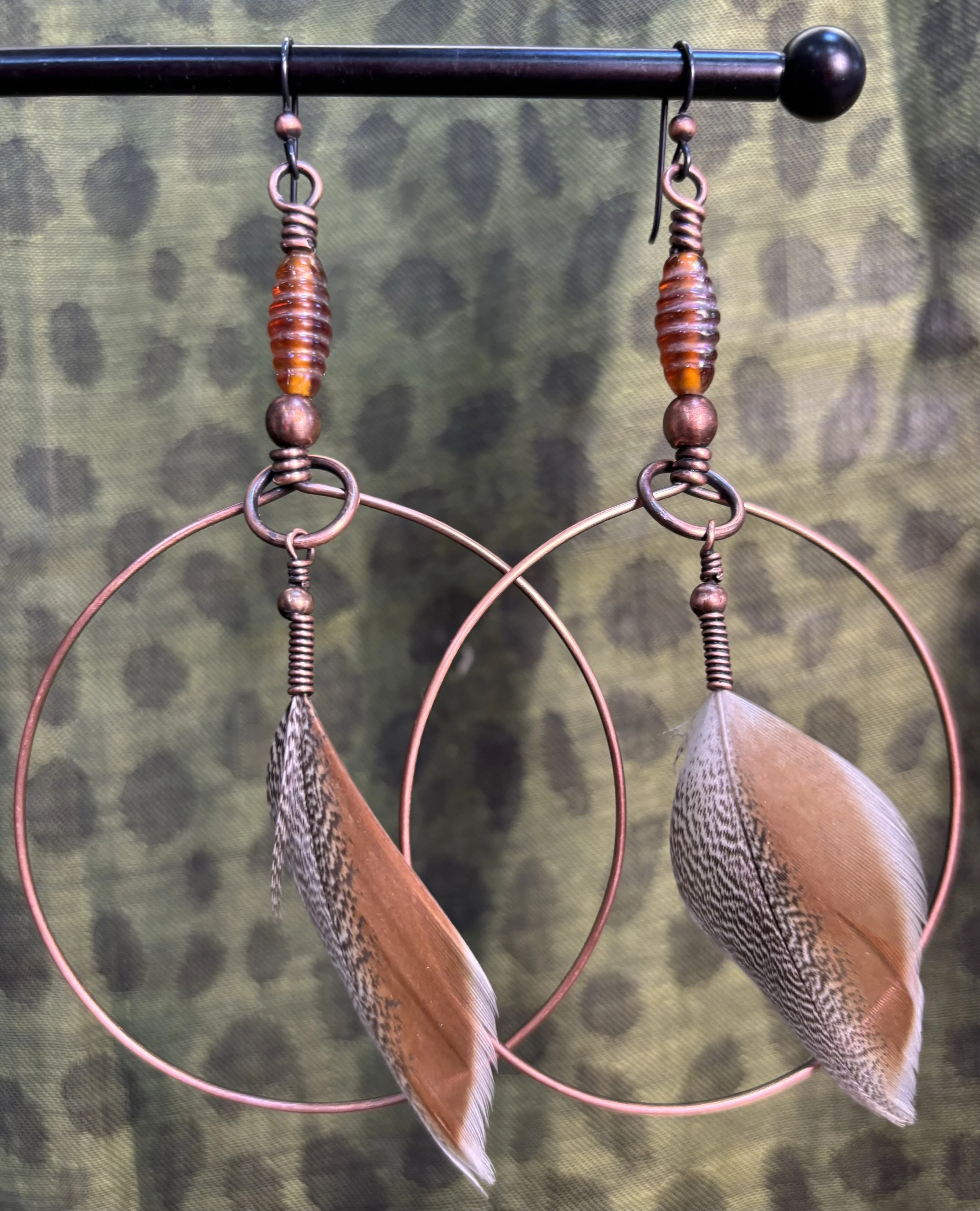Hoops with orange feather.jpeg