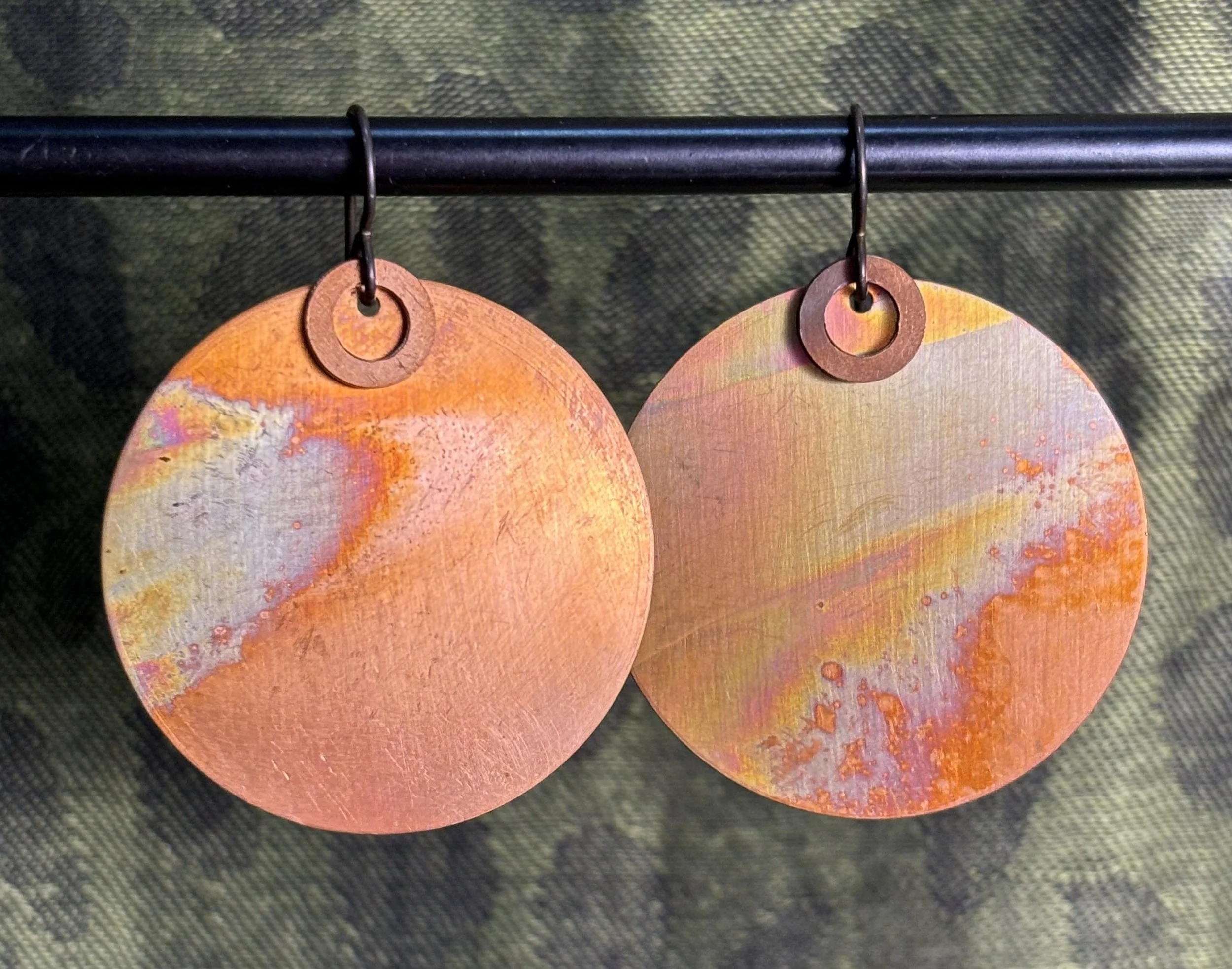 Large torched copper disks.jpeg