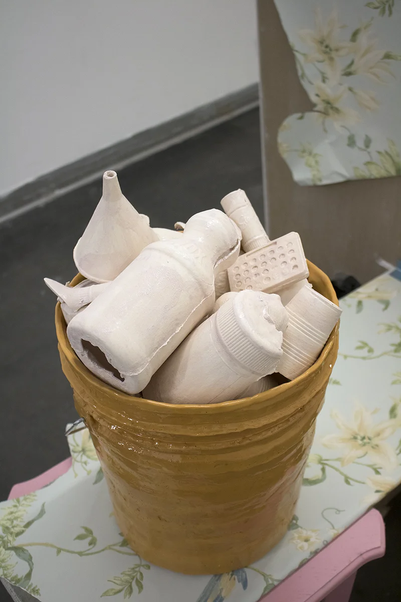 House Fragment Pt. II Porcelain Slip Cast Objects Glazed Together in Handbuilt Terracotta Bucket, Wood, Drywall, Wallpaper, Gap Filler, Glitter, Found Table, Acrylic, Duct Tape 2018 Varying dimensions in 4’x4’x3’ space