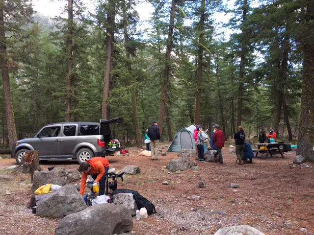 Everyone busy setting up the campsite scene.