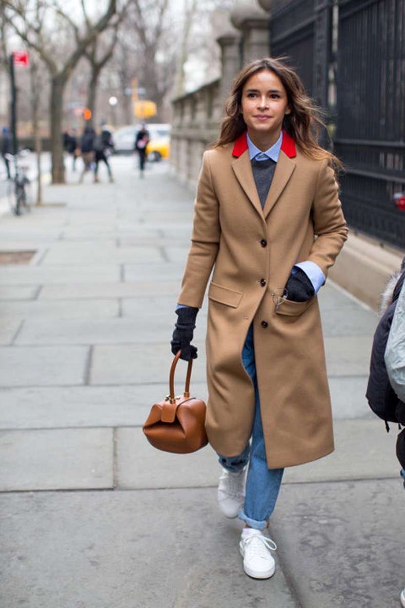 winter-work-outfit-rolled-jeans-white-sneakers-colored-shirt-sweater-over-oxford-shirt-camel-coat-miroslava-duma-brunch-weekend-winter-outfits-nyfw-street-style-2016-hbz.jpg