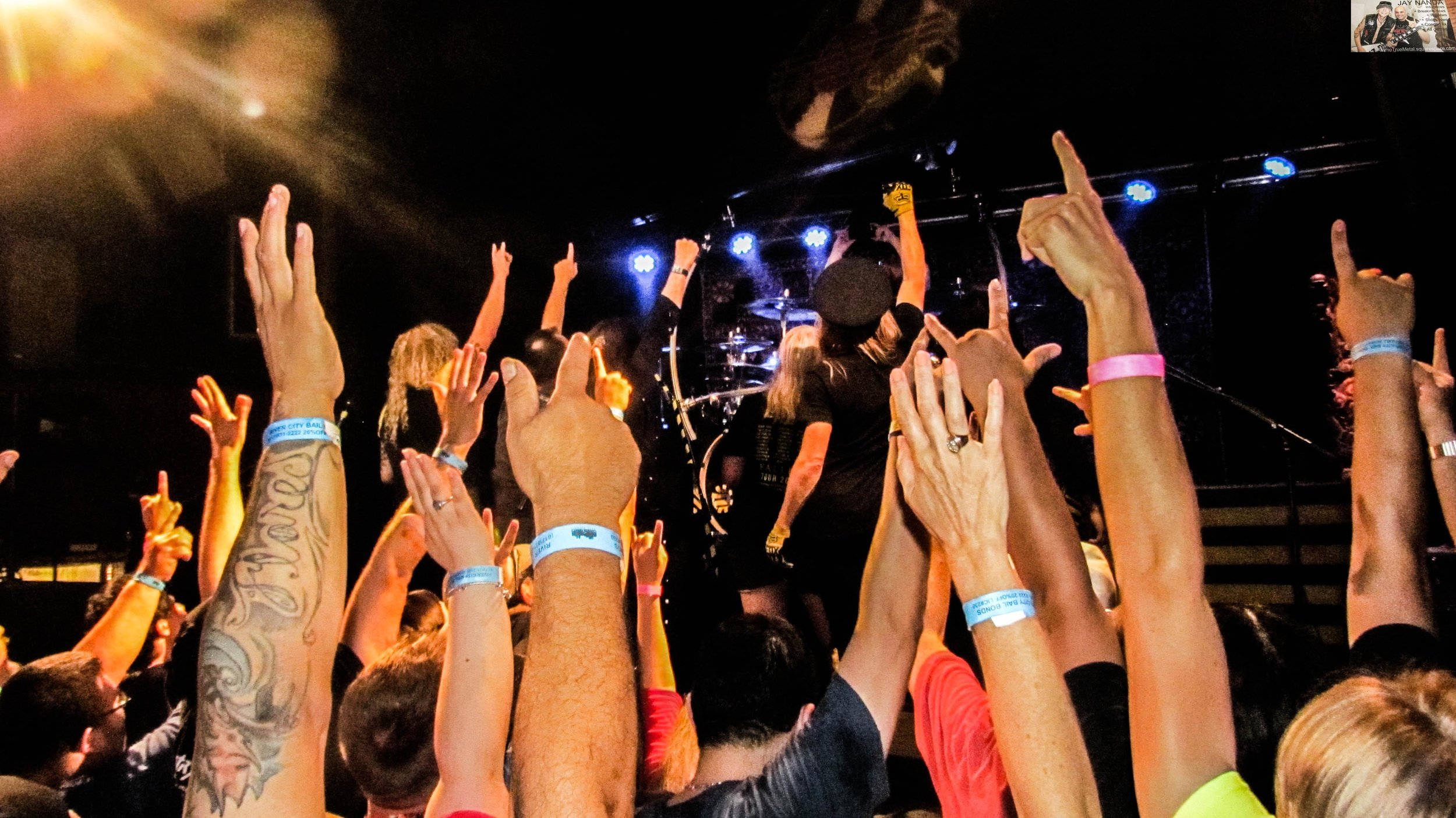  Band and fans pose for a picture at show’s end. 