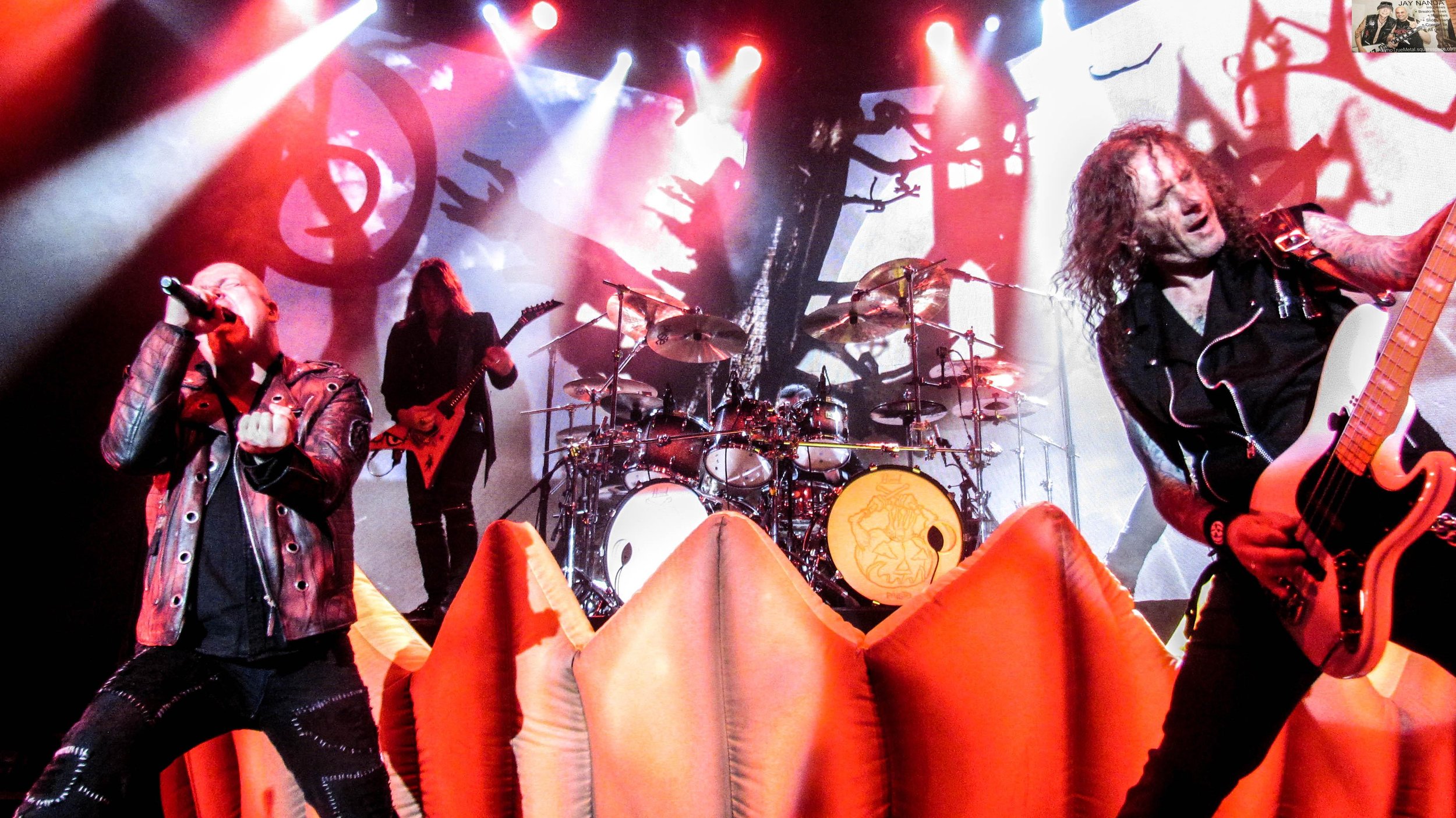 Vocalist Michael Kiske (left), who was fired from the band in 1993, joins Grosskopf on bass (right), original guitarist/vocalist Kai Hansen (second from left) who left the group in 1988 and drummer Dani Loble on “Halloween.”