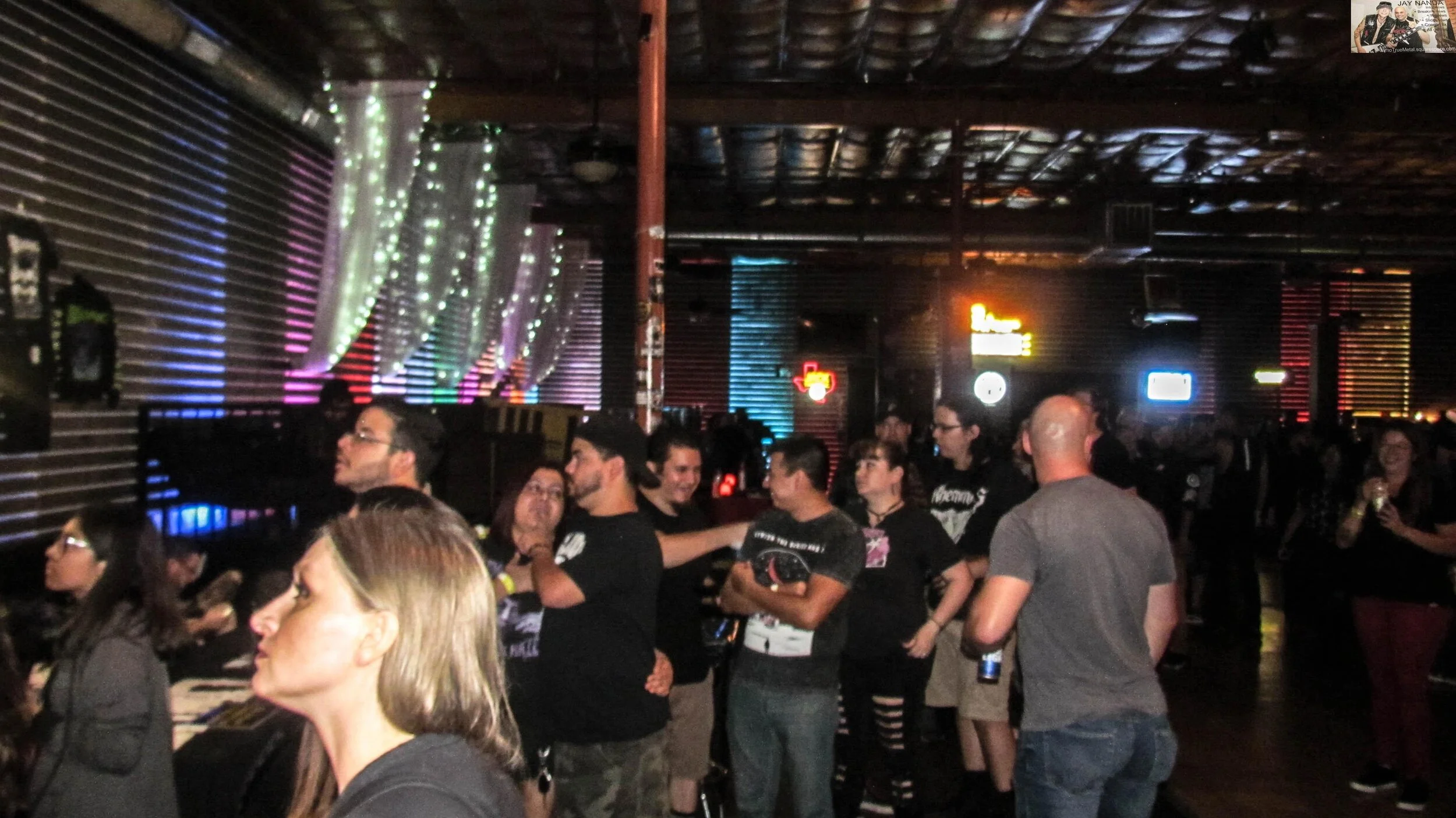 The line for merch stretches around the inside of the Rock Box.
