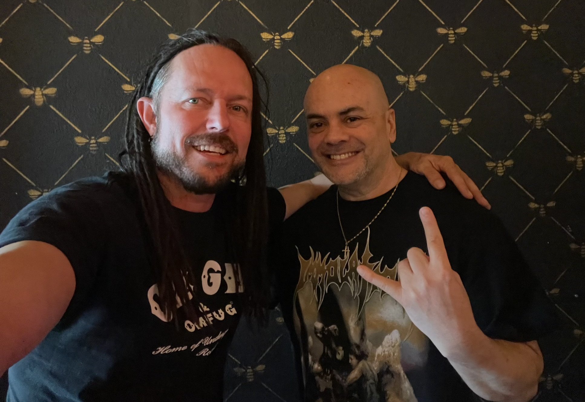  Disturbed bassist and Austin resident John Moyer (left) and the author catch up on old times and discuss the Wacken Metal Battle State Final. Moyer was checking out Austin band and 2020 Wacken State Final victor Hanna Barakat, whose album  Siren  he