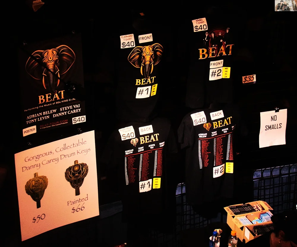  The T-shirt stand was a popular stop between sets.  