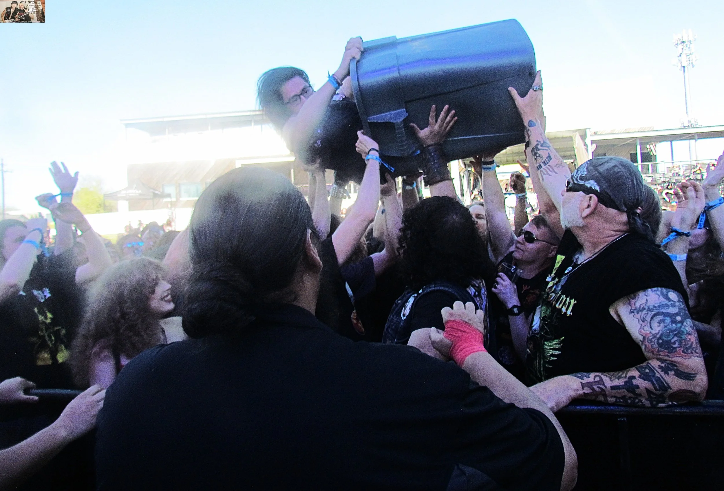  This fan takes crowd surfing to another level during the performance of  Ample Destruction.  