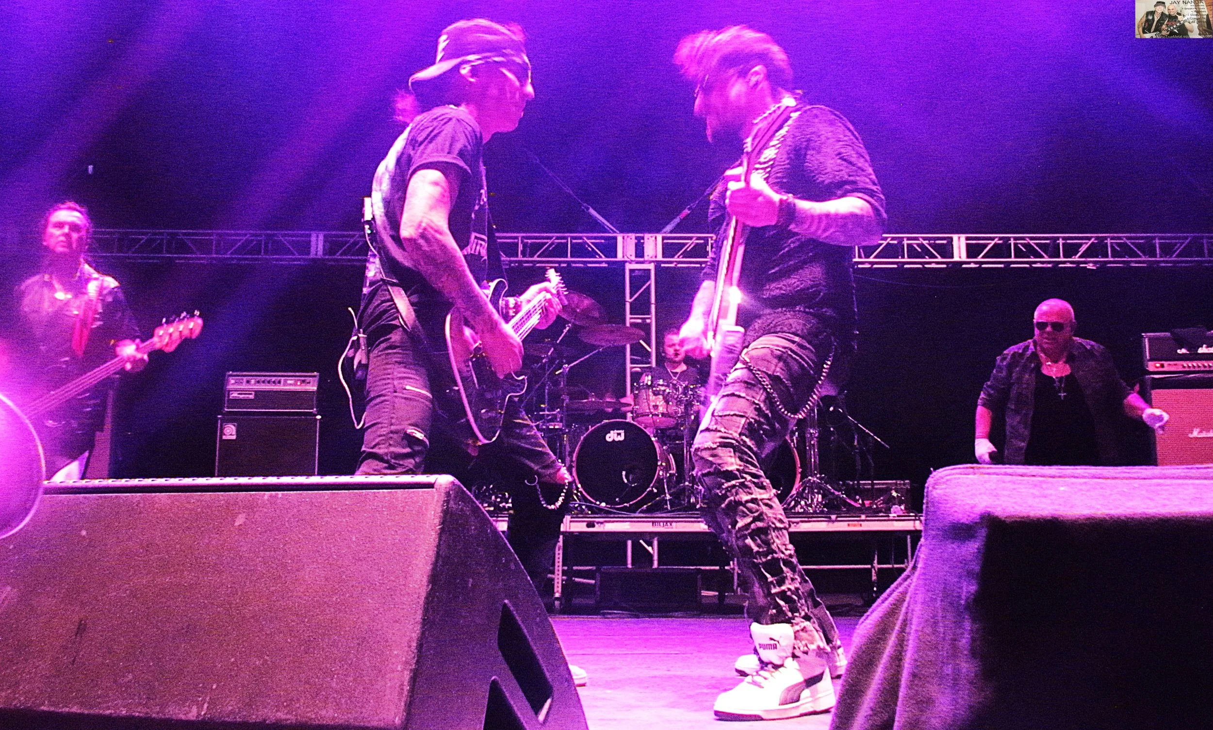  The twin-guitar attack of Brentini (left) and Dammers is on display during “Midnight Mover.” 