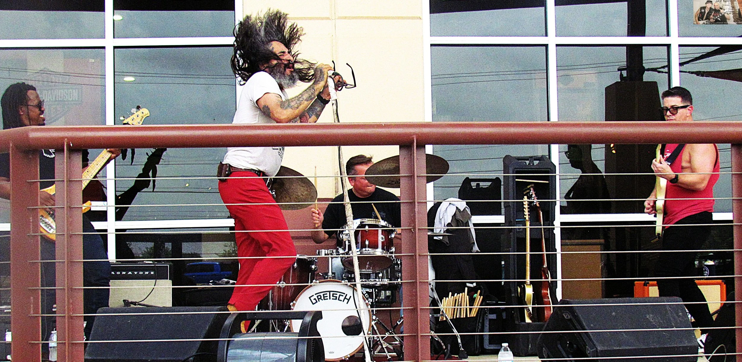  When he wasn’t playing guitar, King was slinging his mic stand and going wild on stage as was his wont with The Heroine.  