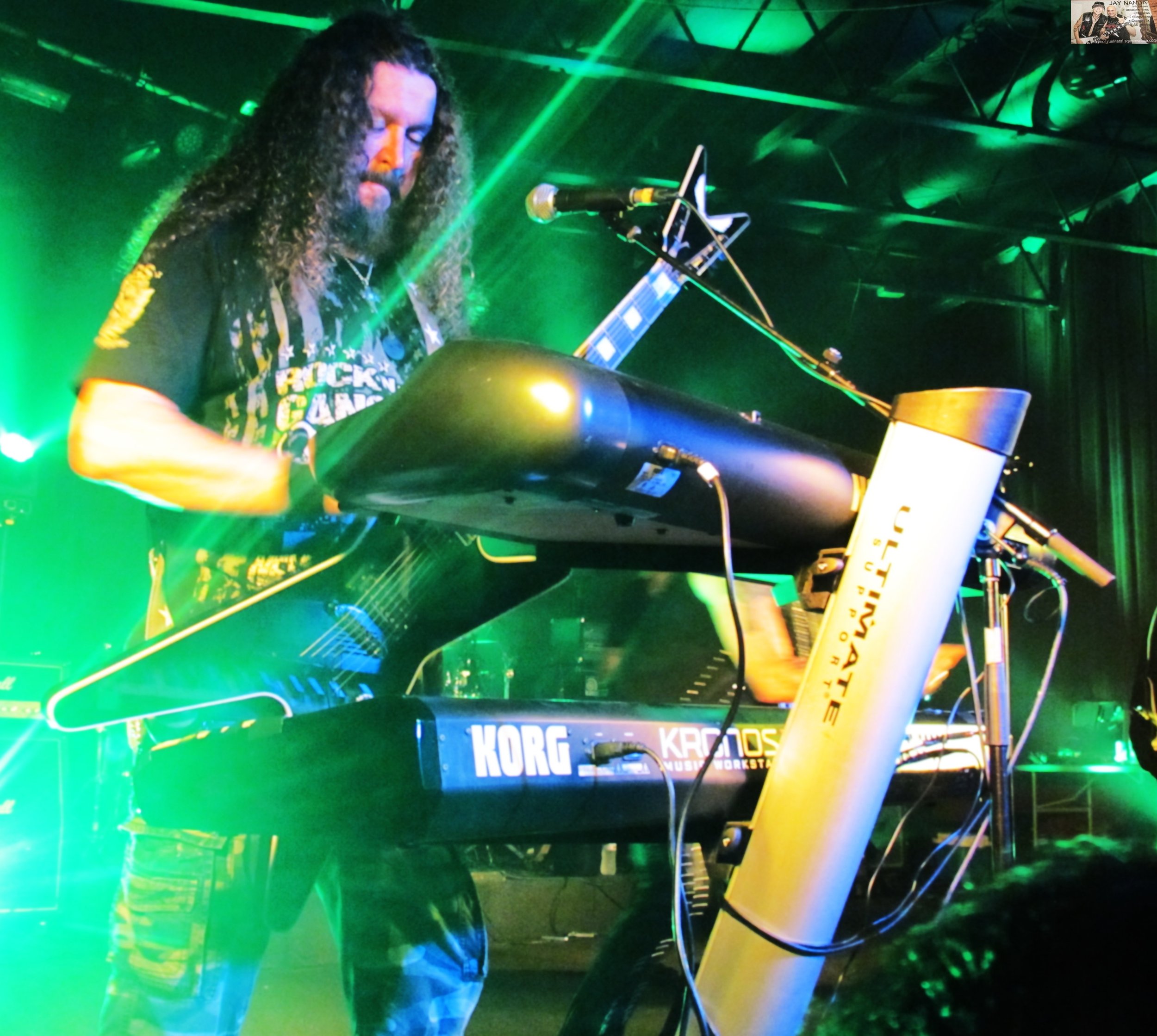  Wayne Findlay rocks the keys and rhythm guitar during “Venus.”  